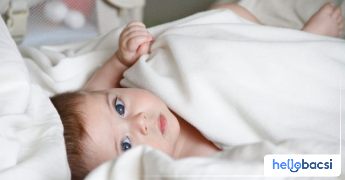 What are the common causes of dark circles under the eyes in newborns?